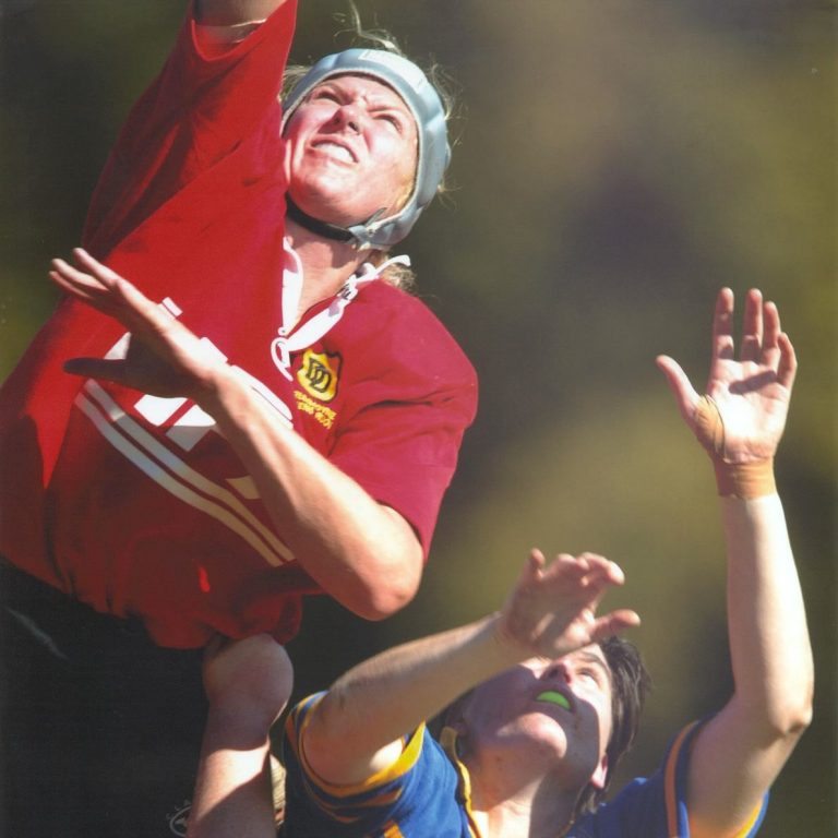 Kim Skildum-Reid playing rugby